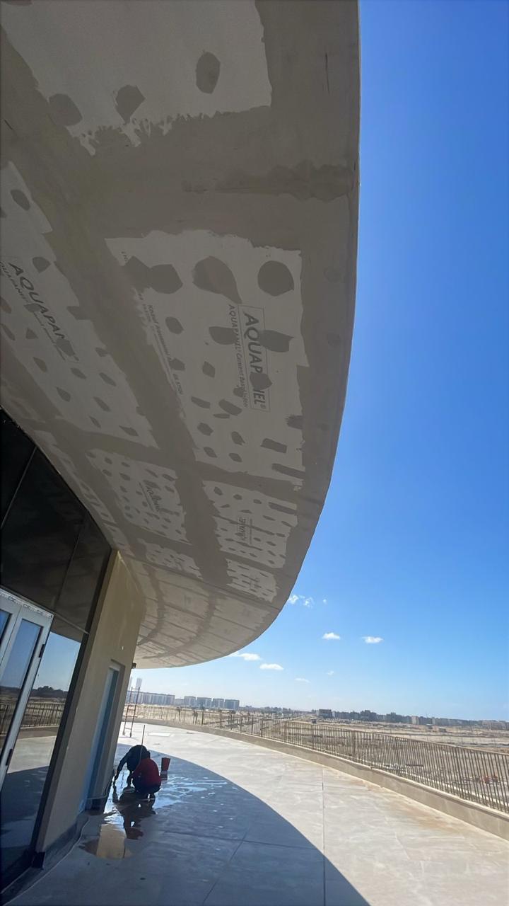 Close‑up of Aquapanel installation with precise joint sealing.